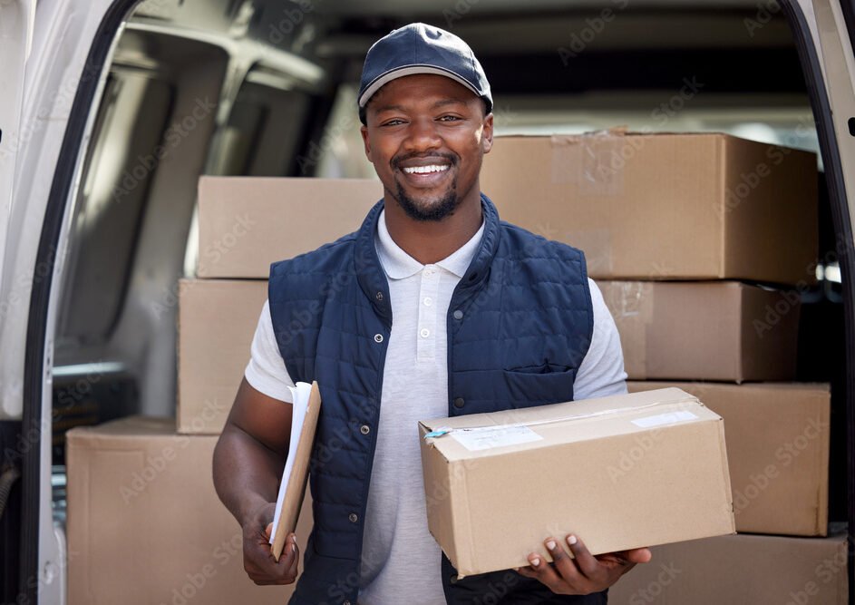 Delivery man, transport and black man with a box and smile outdoor for shipping or courier service. Portrait of happy african person or driver with cardboard package at van from commercial supplier